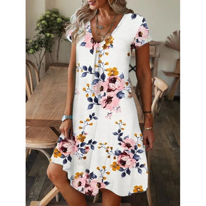 Vestido de manga corta con escote en pico y estampado holgado - España