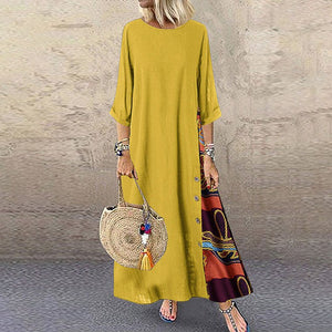 Colarinho redondo floral de outono com botões de bloqueio de cor e vestido de mangas patchwork. Solto e confortável, com cores de retalhos para um ar de elegância e generosidade. Disponível em 12 cores à escolha.